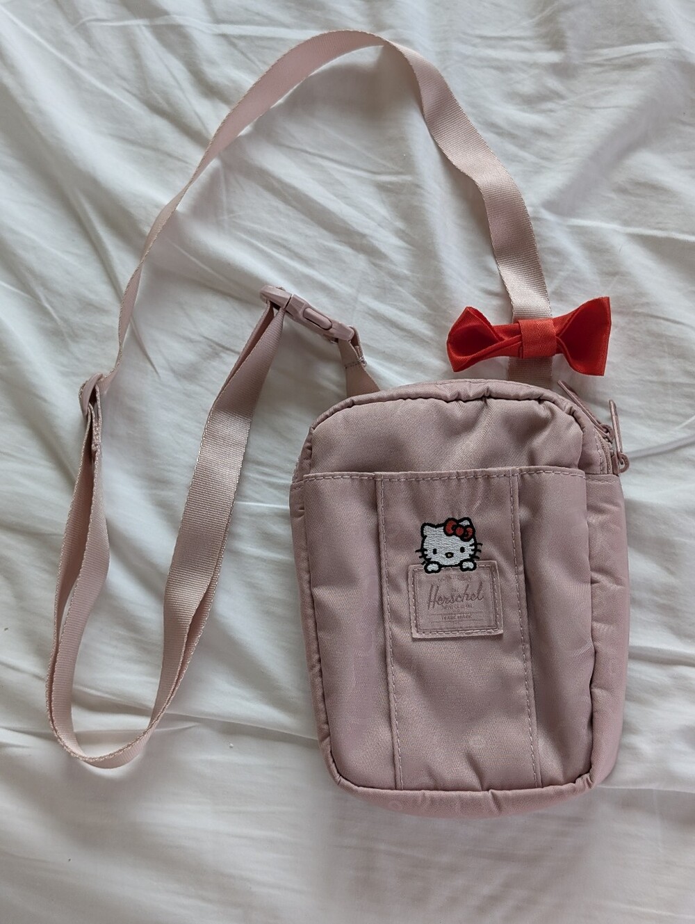 Herschel x Hello Kitty Pink Crossbody Bag with Red Bow Accent